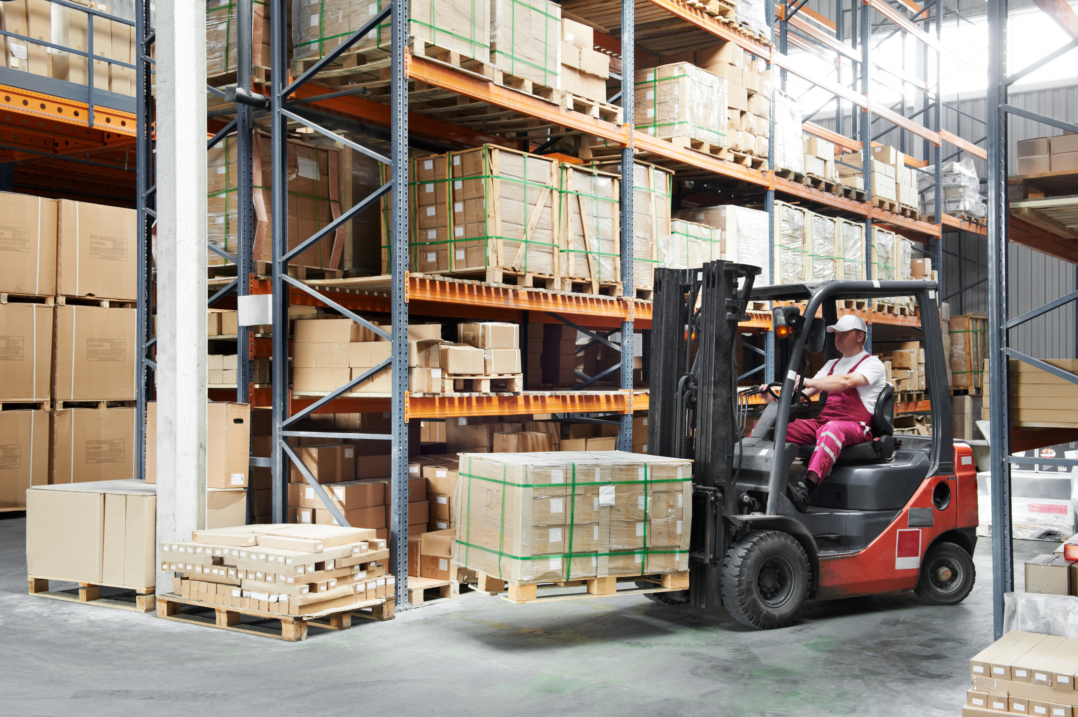 Worker Driver at Warehouse Forklift Loader